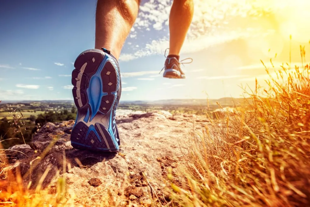 Close-up of a runner’s legs in mid-stride.