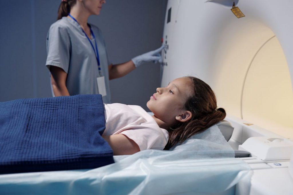 A child receives a CT scan.